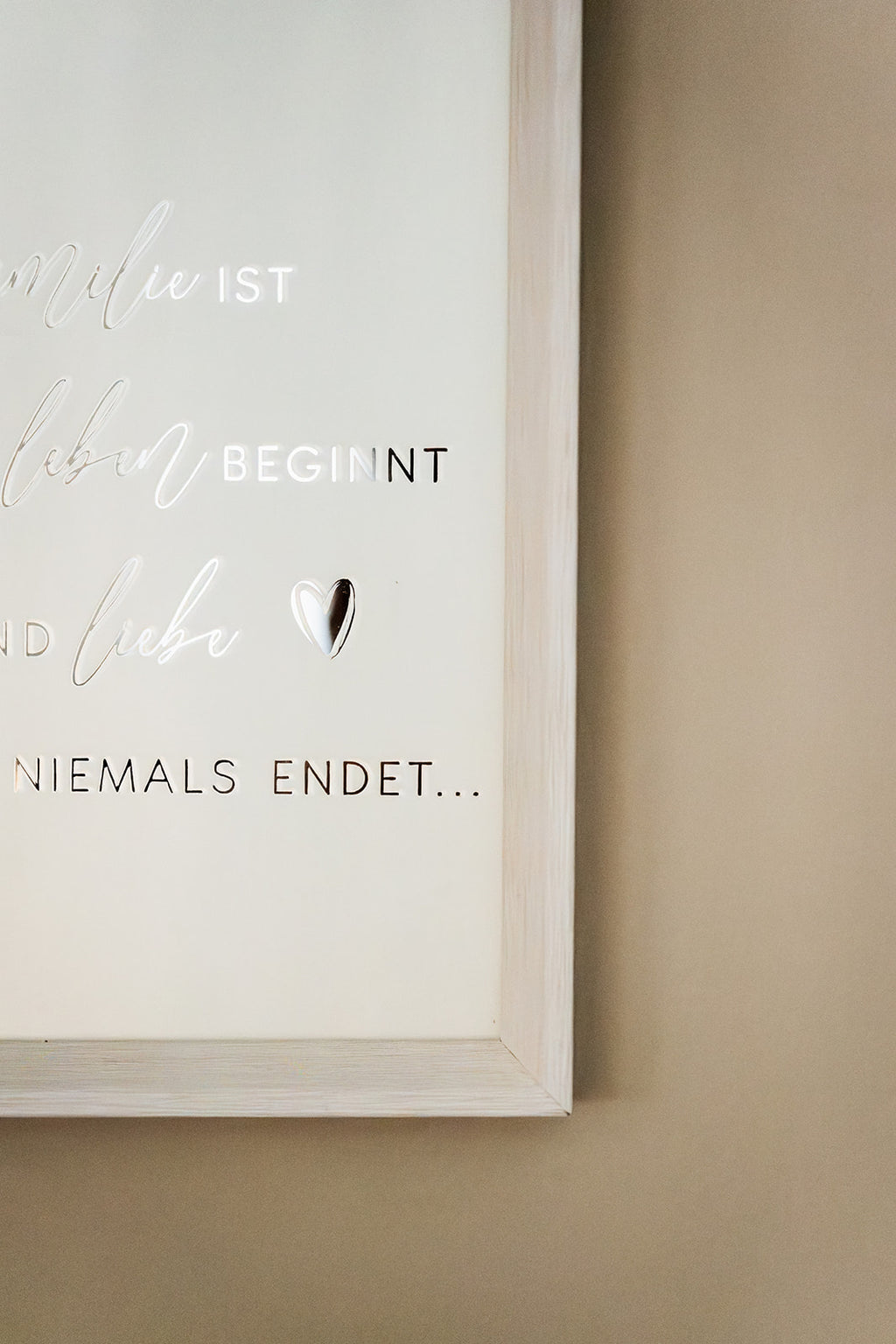 Quadro "Familie ist, wo Leben beginnt"