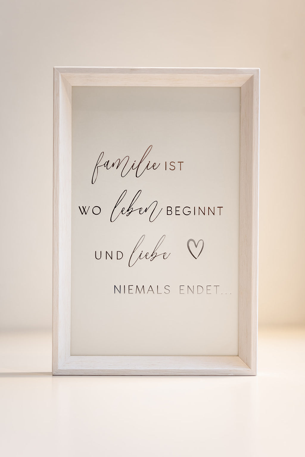 Quadro "Familie ist, wo Leben beginnt"