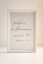 Quadro "Familie ist, wo Leben beginnt"